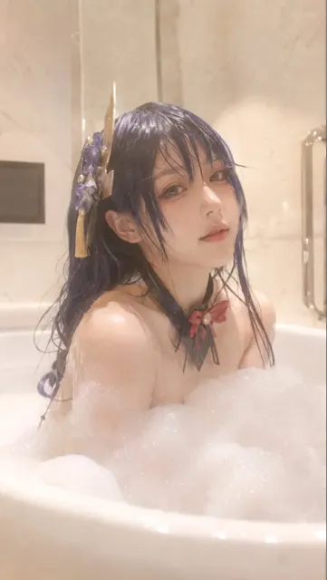 East asian woman bathtub bubble bath cream tone