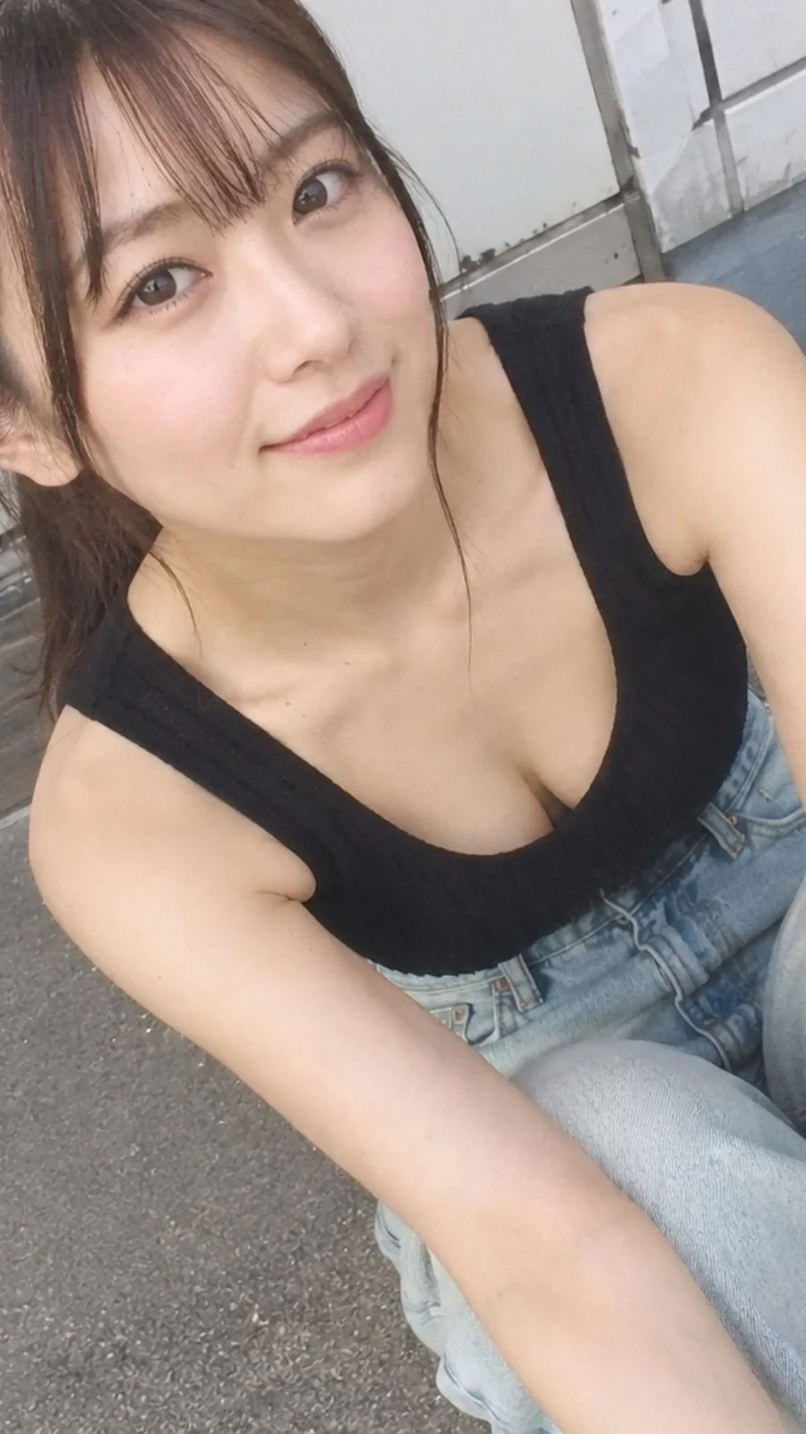 Japanese woman black tank top high angle portrait — After